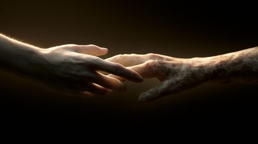 A healthy hand reaching out to touch a diseased, outstretched hand — the moment of contact across the gap.